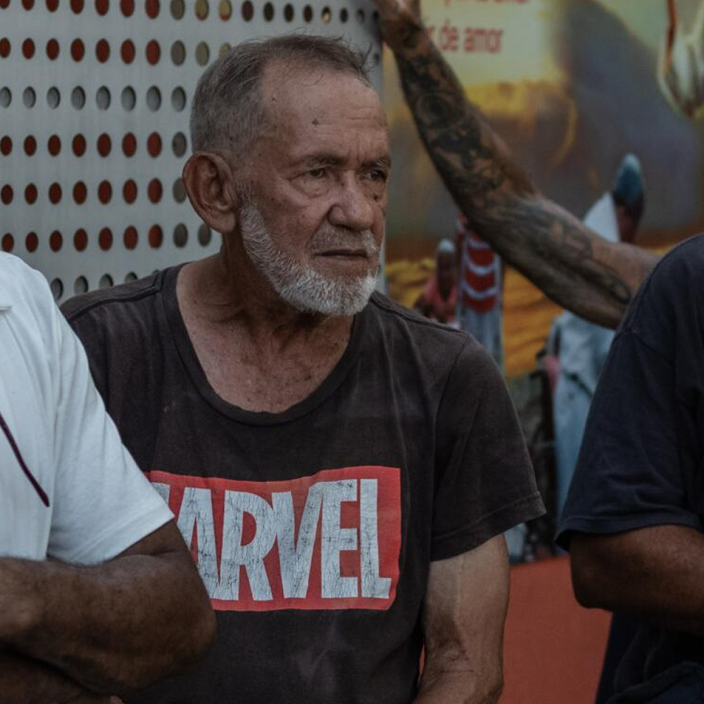 Alberto Rodríguez, 73, photographed outdoors wearing a dark shirt with a red Marvel logo